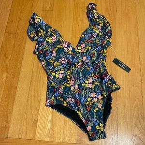 Summersalt ruffle backflip one piece